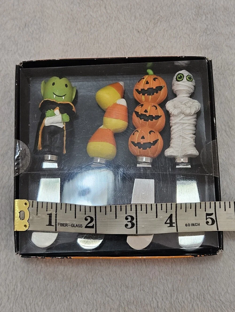 The Pier 1 Imports Halloween Canape Knife Set (4) featuring a spooky Halloween